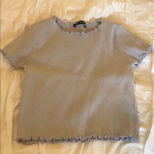 Light blue ruffle shirt